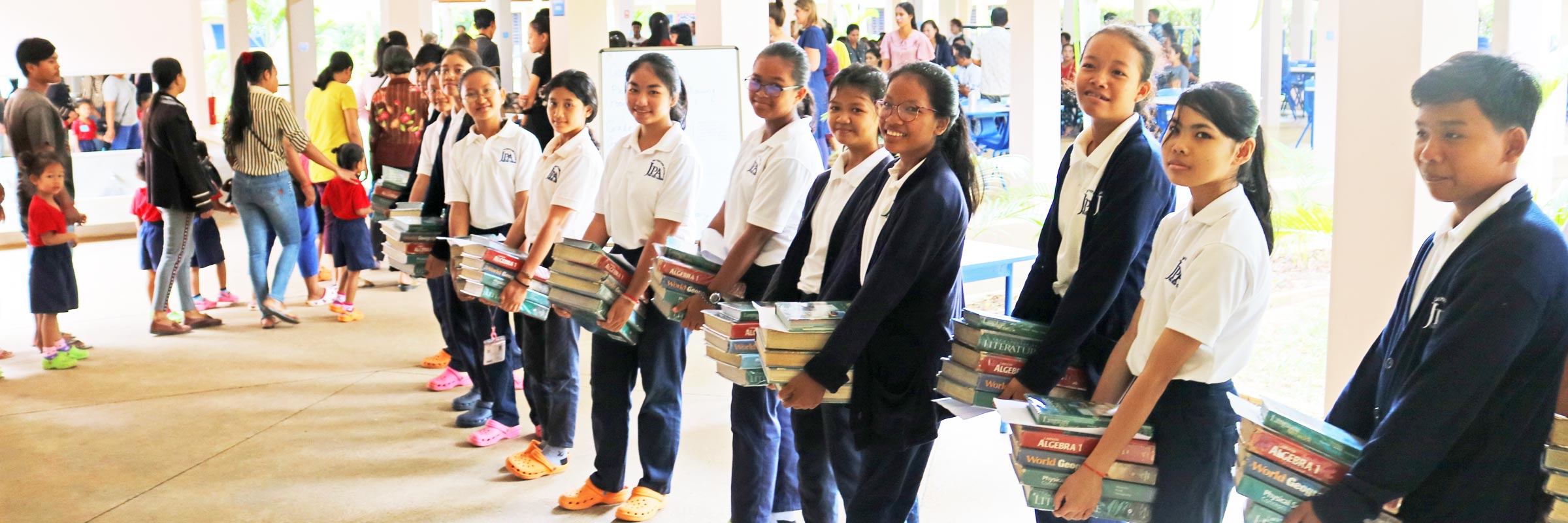 Jay Pritzker Academy students and parents on the first day of school. JPA campus, Siem Reap, Cambodia. Jay-Pritzker-Academy-Siem-Reap-Cambodia.